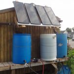 Solar panels and rain barrels