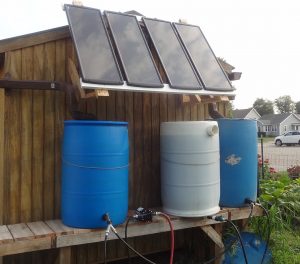 Solar panels and rain barrels